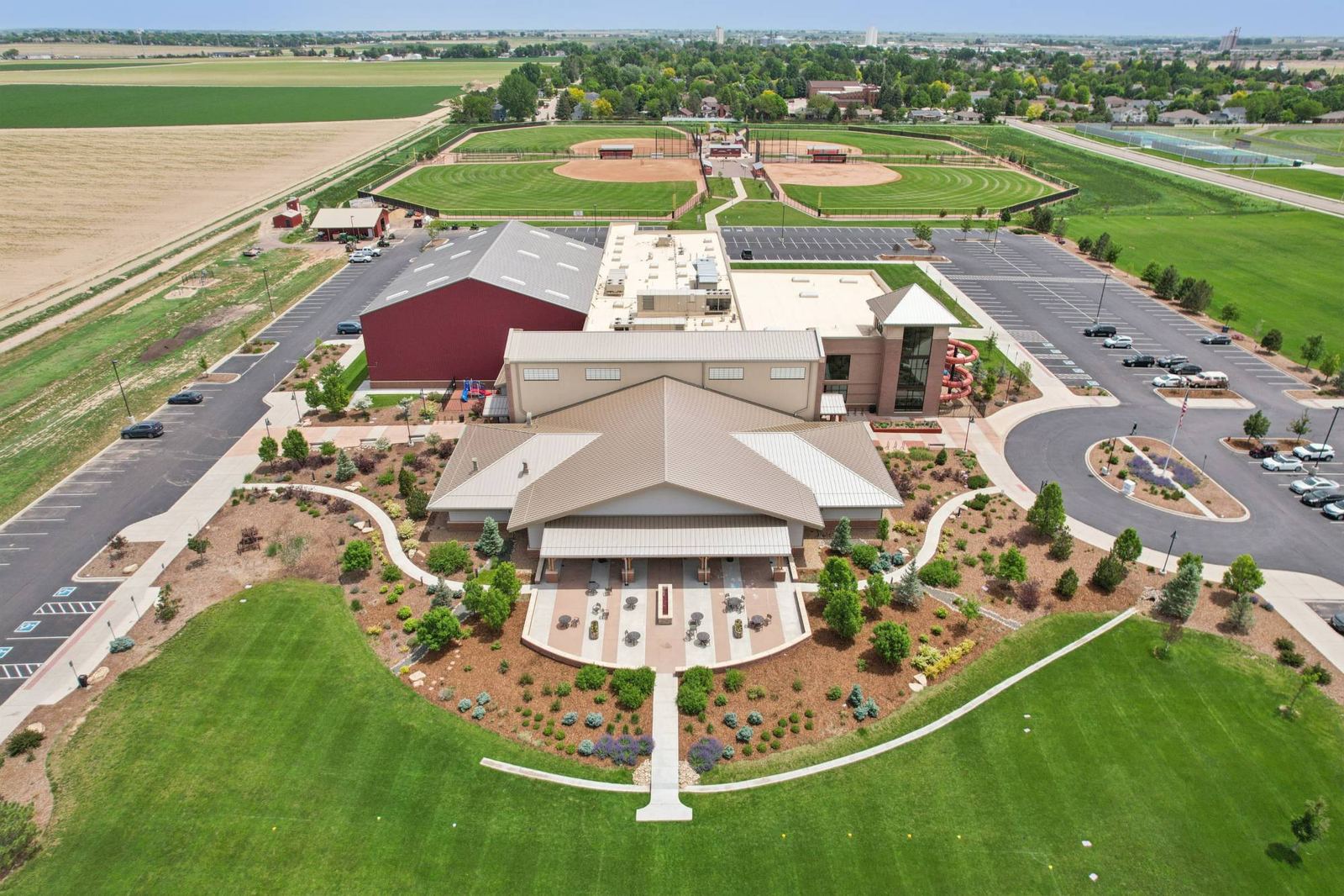 The full community center campus, ballfields behind